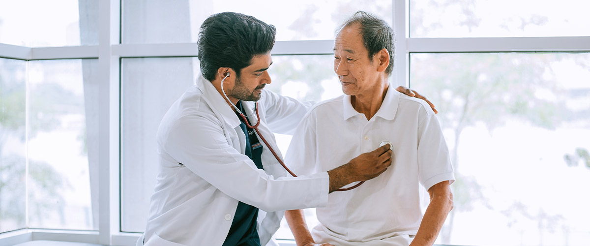 Doctor checking patient heart 