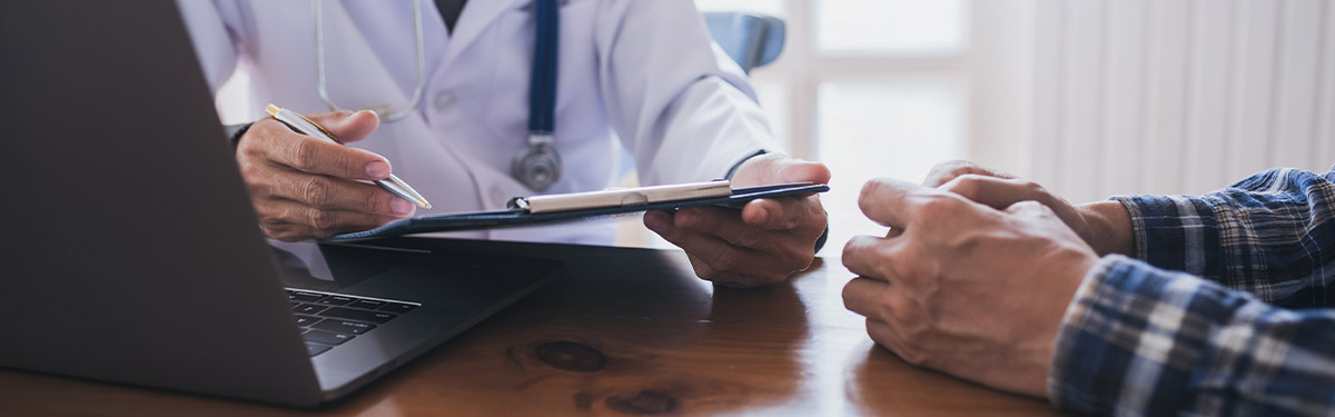 doctor holding clip board