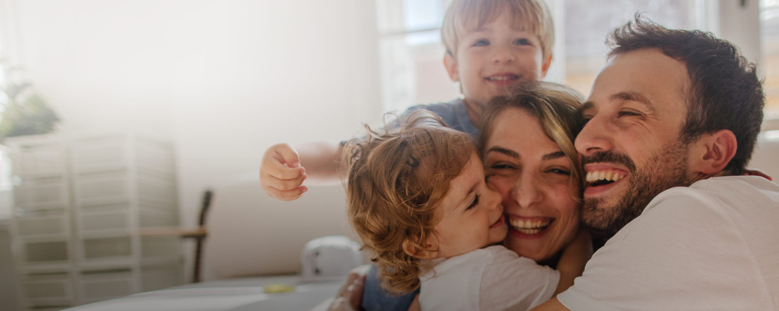 Photo of parents and two children
