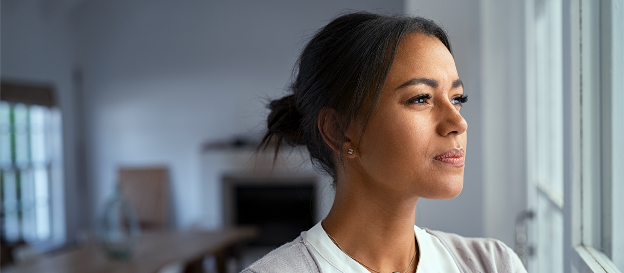 Woman looking to the side.