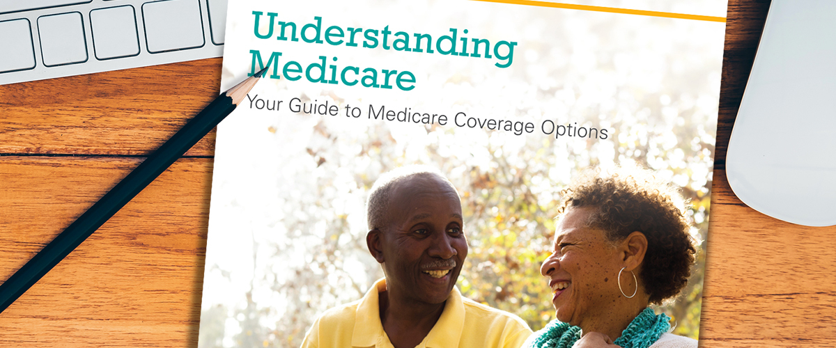Medicare guide sitting next to coffee cup